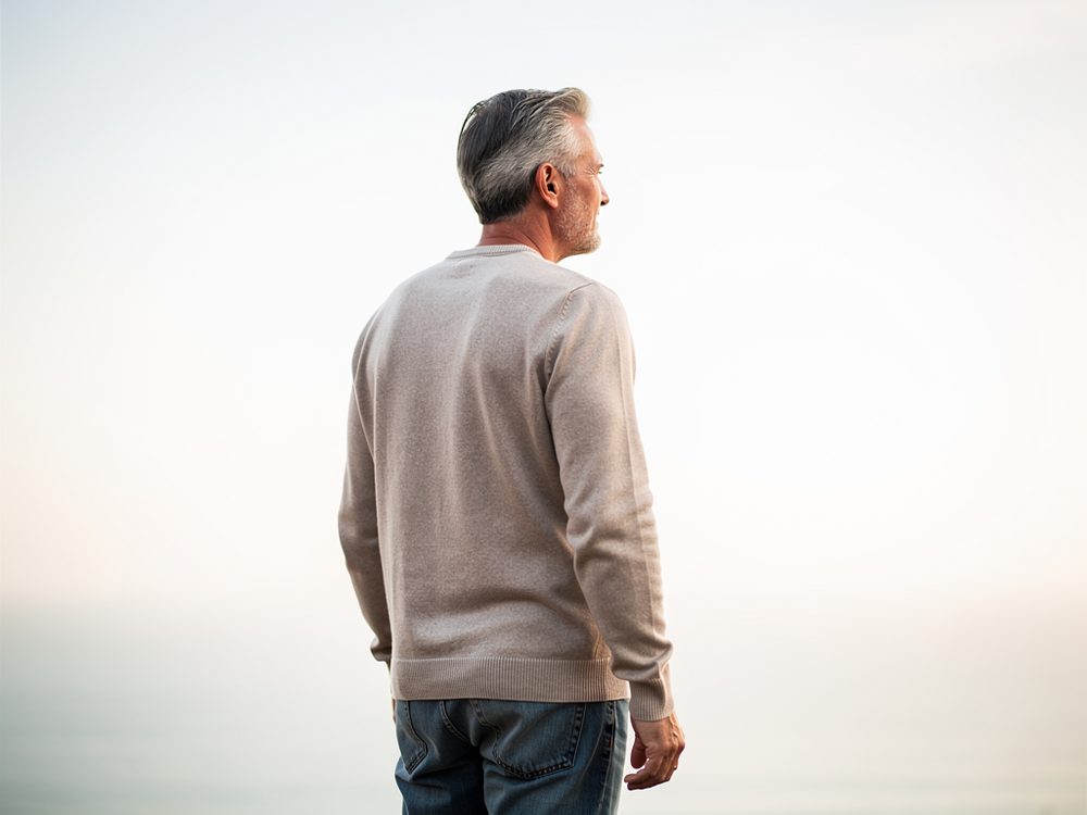 Why Men in Their 50s Shut Down Emotionally: The Burnout-Numbness Cycle That Looks Like Withdrawal